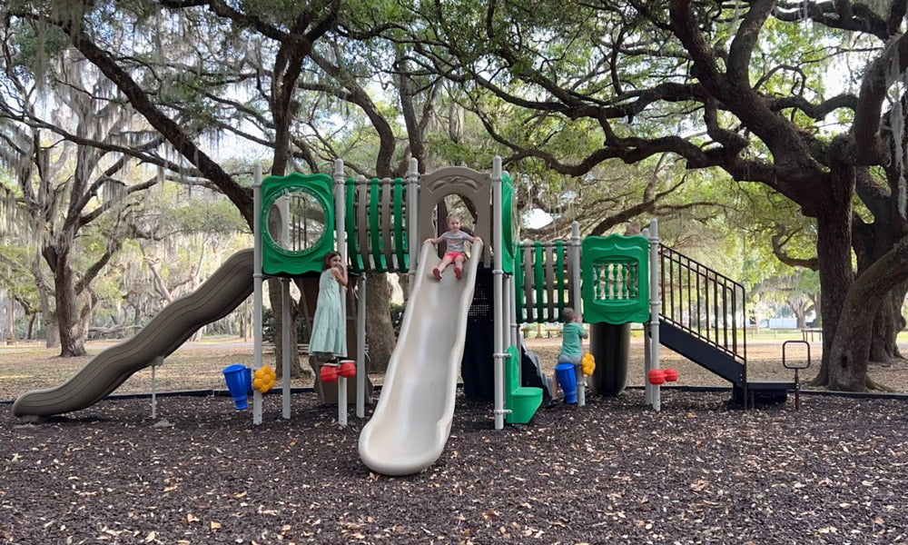Kids playing at playground installation