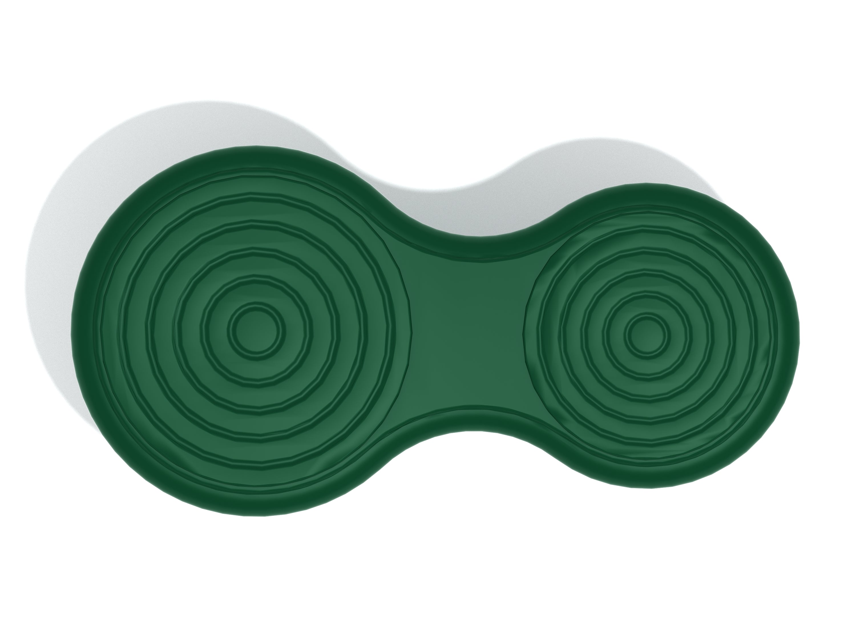 Overhead view of dark green single balance board with textured circular traction patterns and contoured middle section