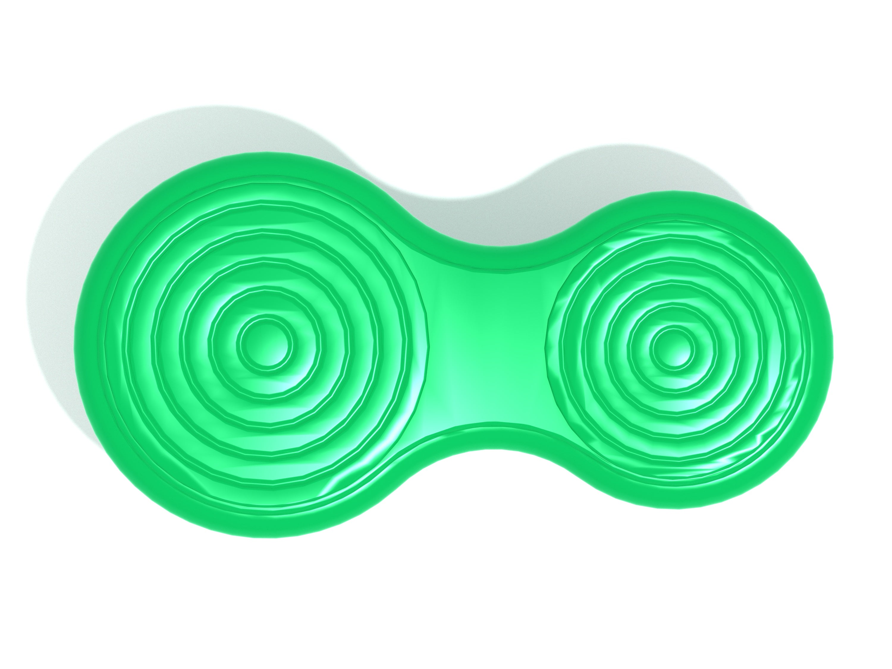 Overhead view of a green single balance board with textured circular traction patterns and contoured middle section