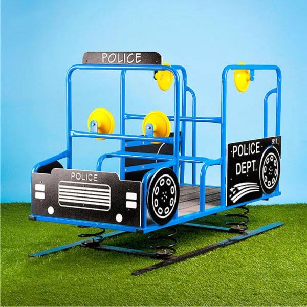 Blue and black police truck spring bouncer with yellow steering wheels and safety-rolled steel frame on green turf