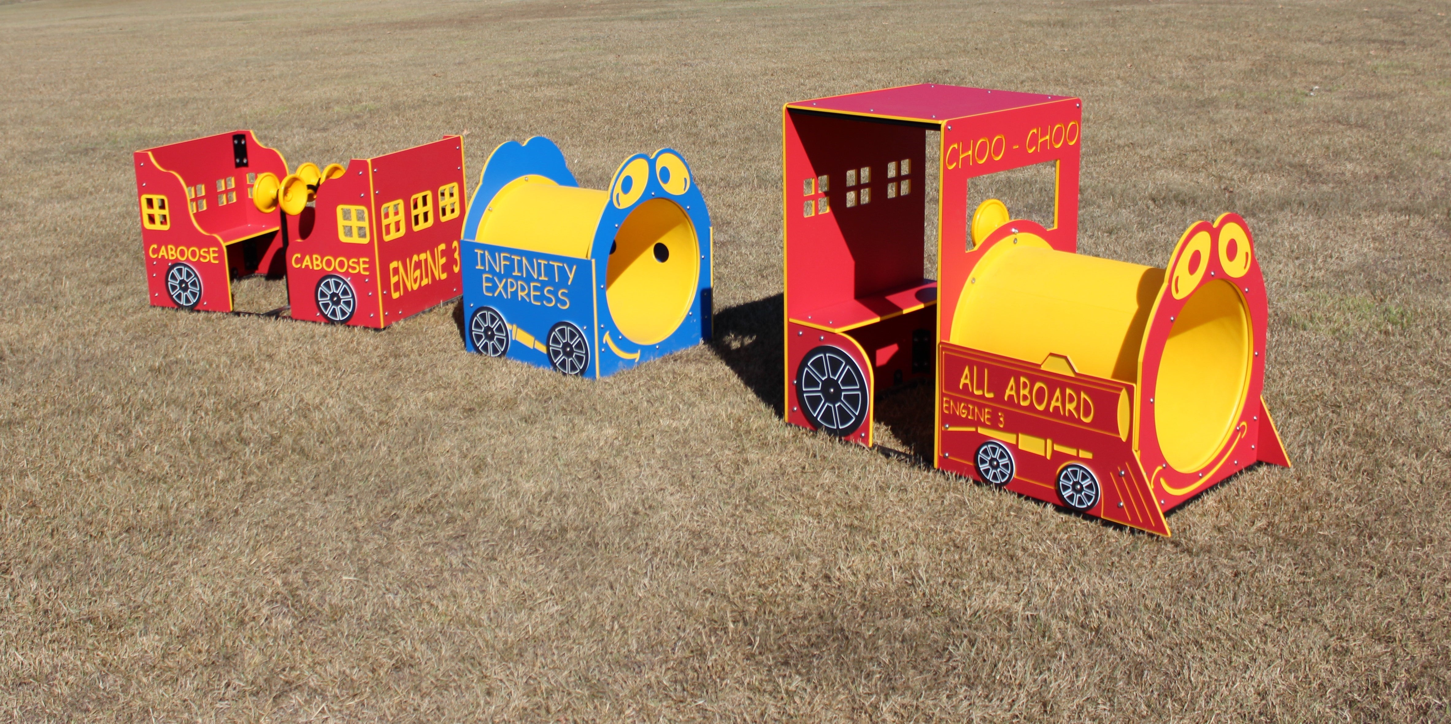 Colorful outdoor playground train set with engine, caboose, and tunnel encouraging active, imaginative play