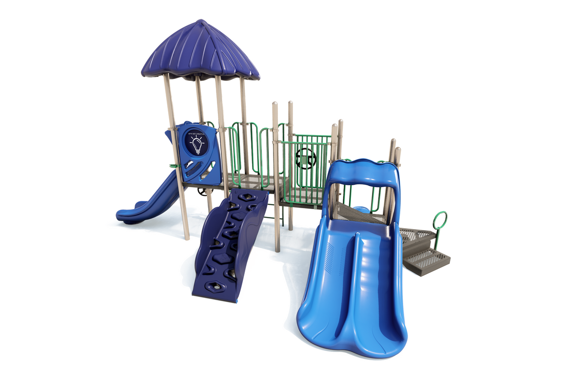 Colorful playground structure with dual blue slides, climbing wall, green railings, and blue canopy roof