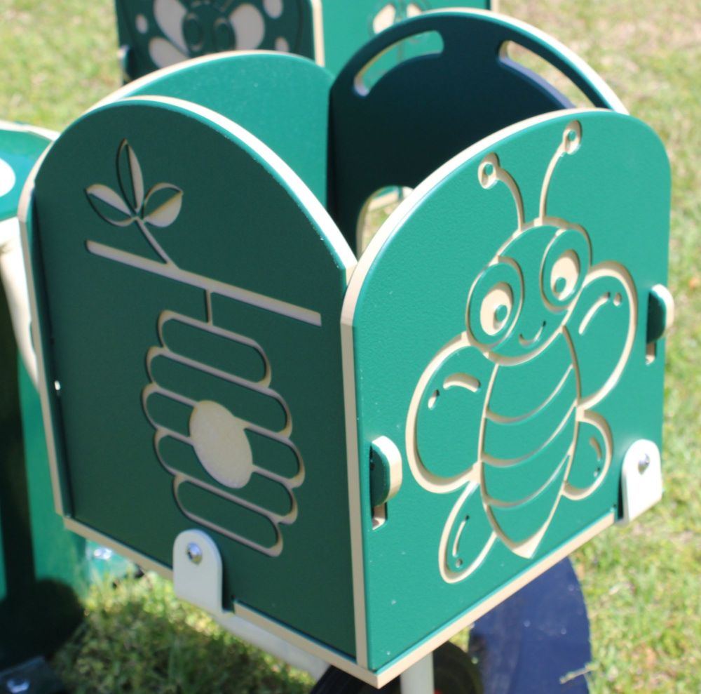 Green four-seat outdoor carousel with insect and beehive cutout panels, playground merry-go-round equipment