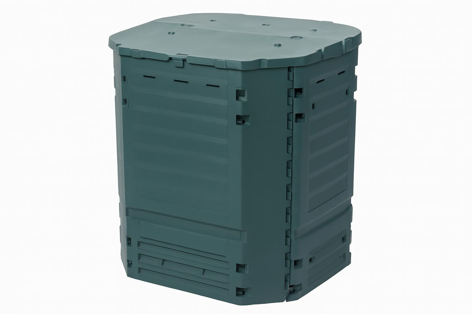 Thermo King 900 Compost Bin in green with dual hinged lids, ventilation slots, and insulated Thermolen® walls on grass near wooden fence