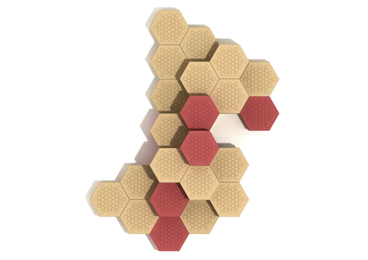Top-down view of tiered hexagonal climbing pods with textured honeycomb surfaces in warm red and tan for playground use