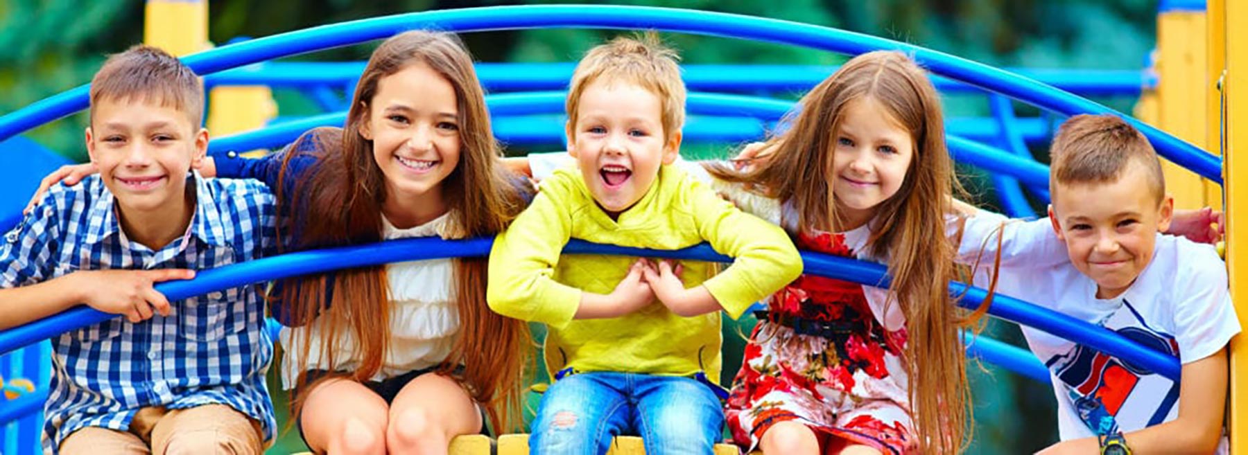 Playgrounds for Schools - Kids sitting on a playground bridge climber