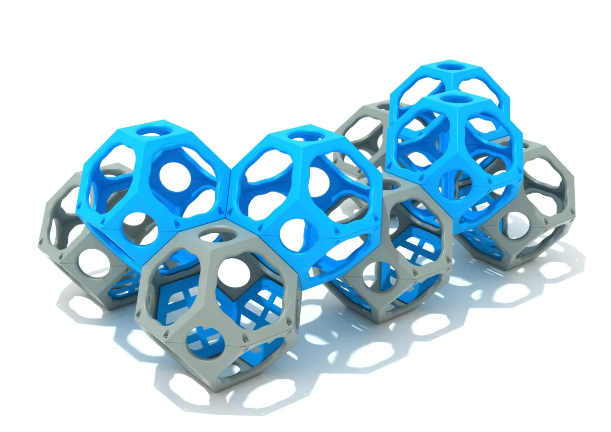 Modular climbing structure with interconnected blue and gray geometric pods for active playground play