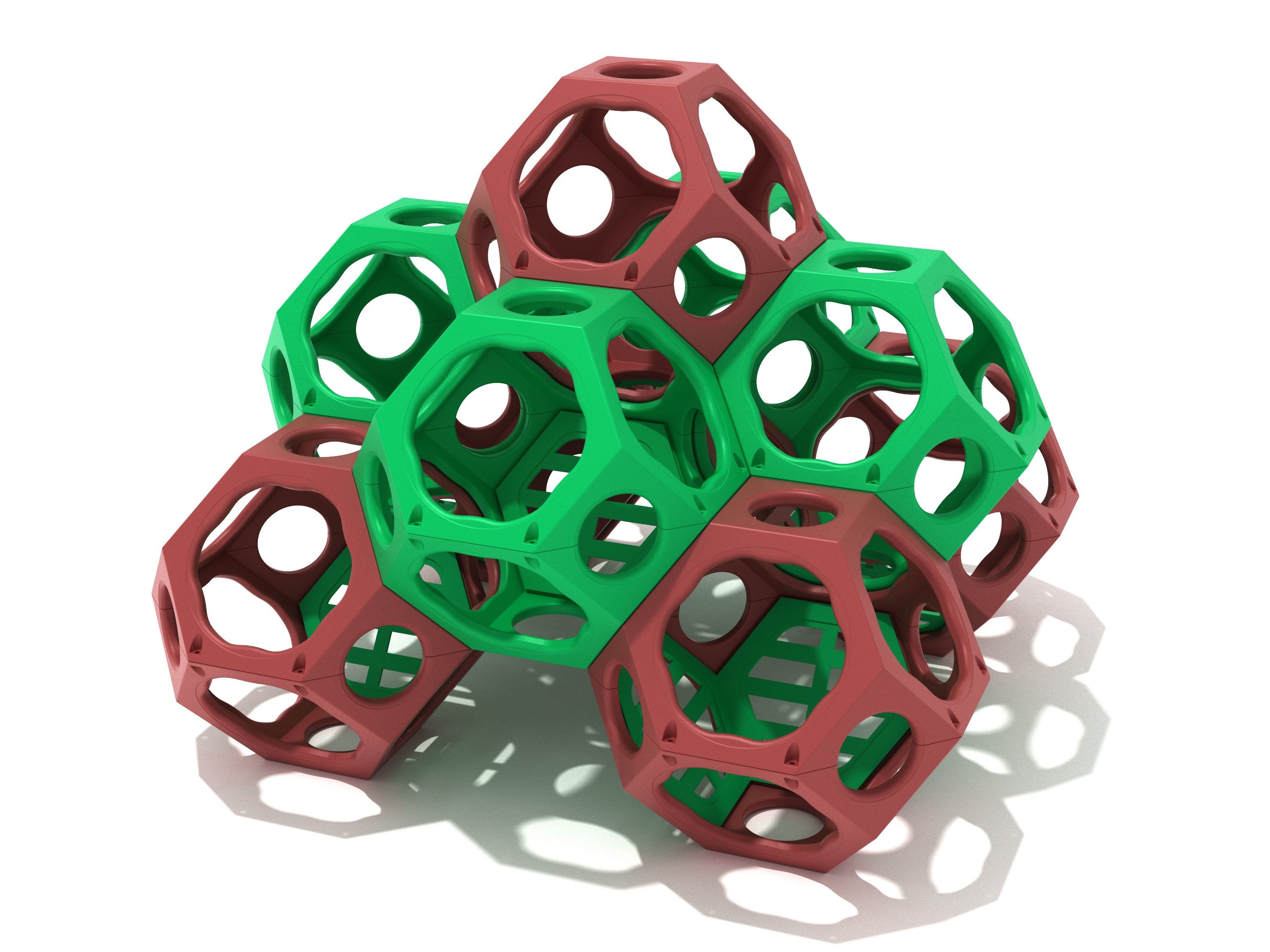 Geometric cluster of red and green open-frame climbing pods with circular openings for kids' outdoor play and coordination