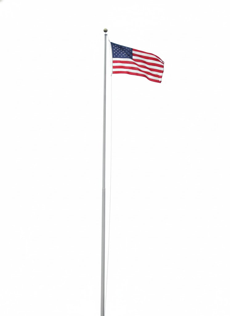 Flagpole 40 Foot High galvanized steel outdoor pole with American flag flying above bare trees under cloudy sky