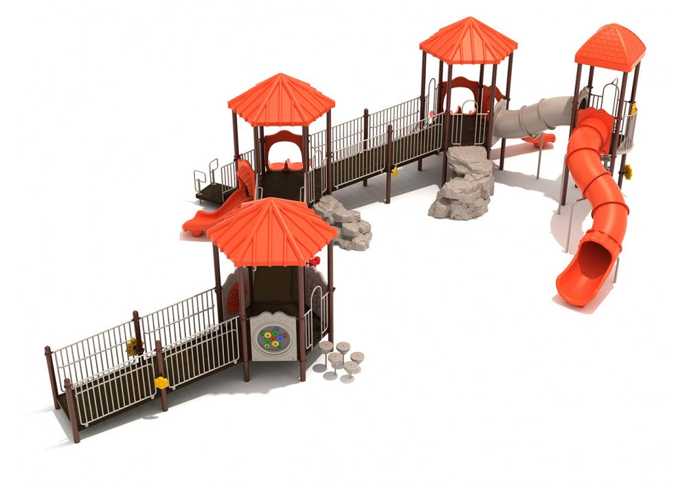 Elevated playground with three hexagonal decks, ramps, tube slides, climbing rocks, and interactive activity panels