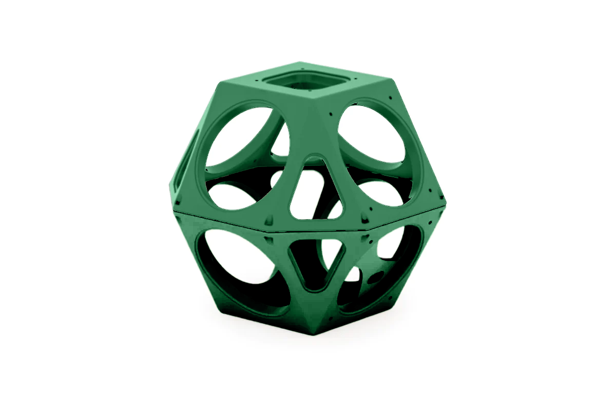 Green geometric climbing structure with circular cutouts, designed for play and integration into larger playground sets.