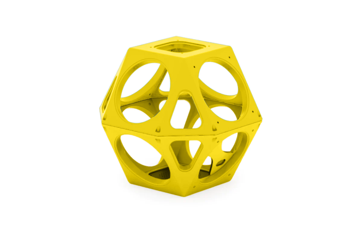 Yellow geometric climbing structure with circular cutouts, designed for playgrounds and standalone play use.