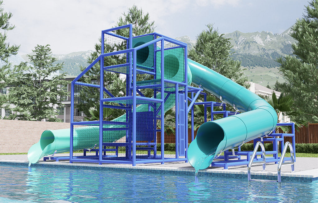 Two teal enclosed water slides with blue metal framework descending into a pool, surrounded by trees and mountains.