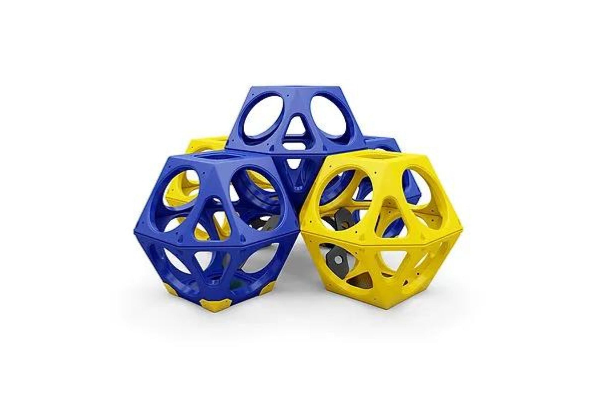 Cluster of five blue and yellow geometric climbing cubes with circular and triangular openings for playground use