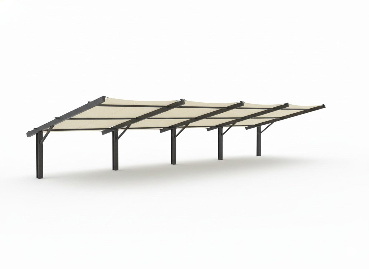 Cantilever Wing Cabled Shade Structure with slanted white fabric top and two grey metal columns over outdoor seating at dusk