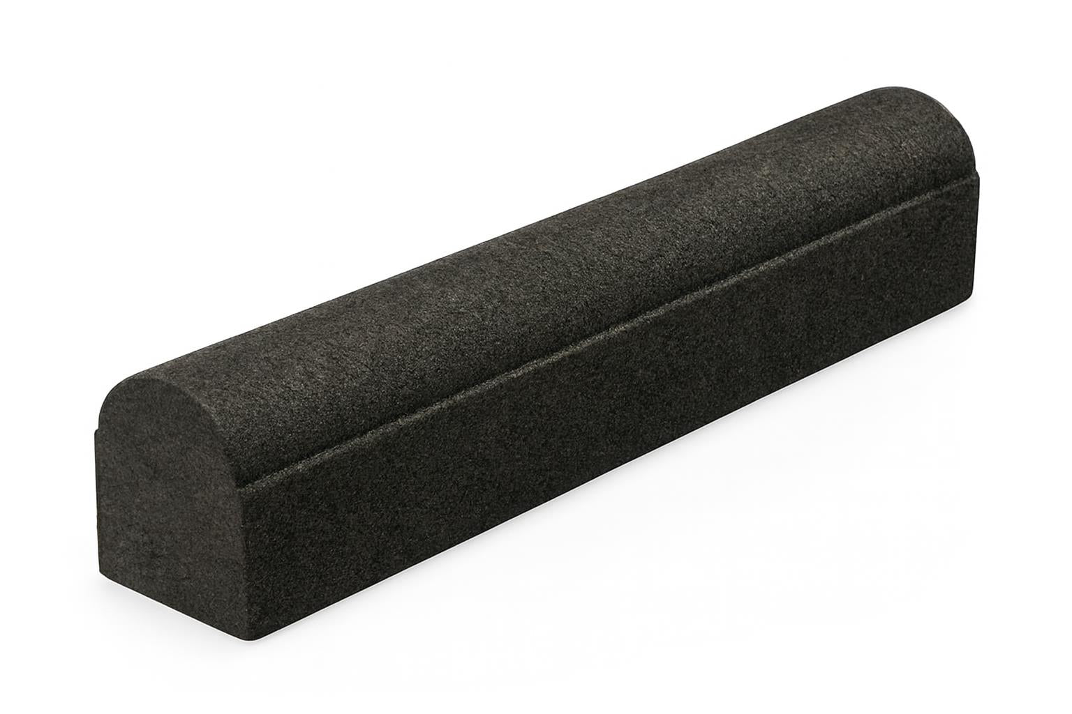 Rubberific Playground Border Timbers black flexible rubber edging with rounded top and drainage ports between grass and mulch