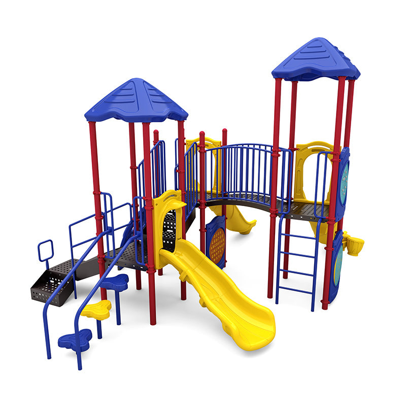 Colorful playground structure with blue roofs, yellow slides, red posts, climbing elements, and interactive play panels