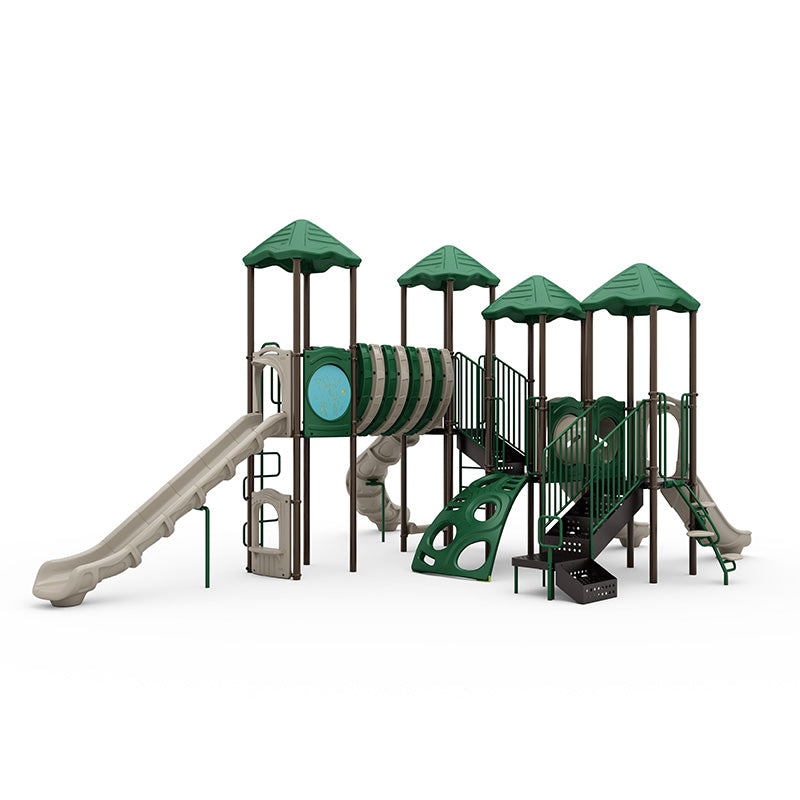Large playground structure with green roofs, beige slides, climbing panels, and a connecting tunnel between platforms.