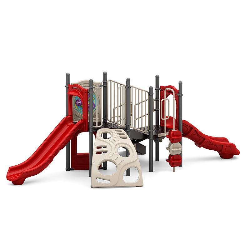 Outdoor playground with two red slides, beige climbing wall, interactive play panels, and black support posts.
