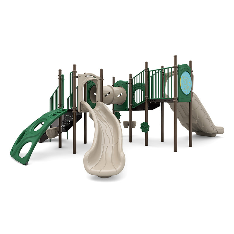 Large green and beige playground structure with double slides, climbing walls, tunnel, and interactive panels including bongo drums and bubble window.