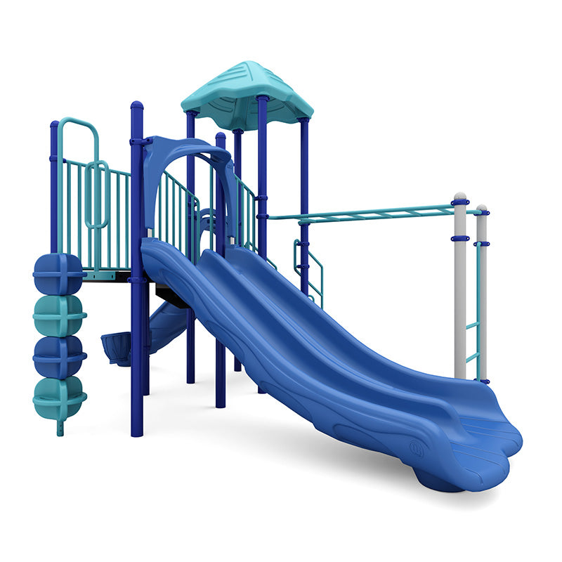 Vibrant blue and teal playground with double slide, climbing ladder, monkey bars, sensory play elements, and ADA transfer station.