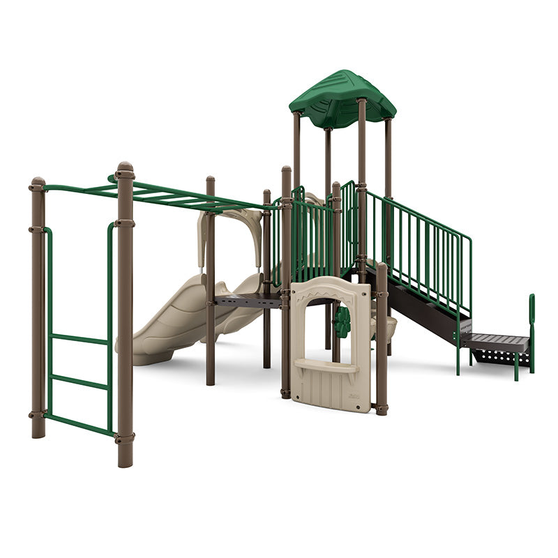 Tunnel Rush Playground with green and beige slides, climbing ladder, monkey bars, and shaded platform in natural play setting