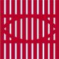 Red metal trash receptacle panel with wave pattern made of expanded metal mesh