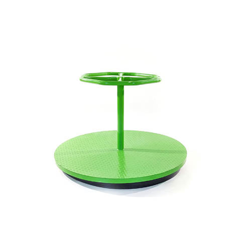 Green steel merry-go-round with central handrail and textured platform for children’s playground use