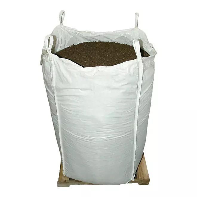 GroundSmart Playground Rubber Mulch Earthtone Supersack filled with brown recycled rubber mulch on wooden pallet
