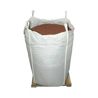 Large white supersack filled with vibrant red recycled rubber playground mulch on wooden pallet