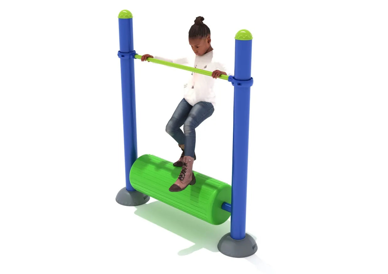 Child balancing on green rolling log playground equipment with blue support poles and overhead steel bar