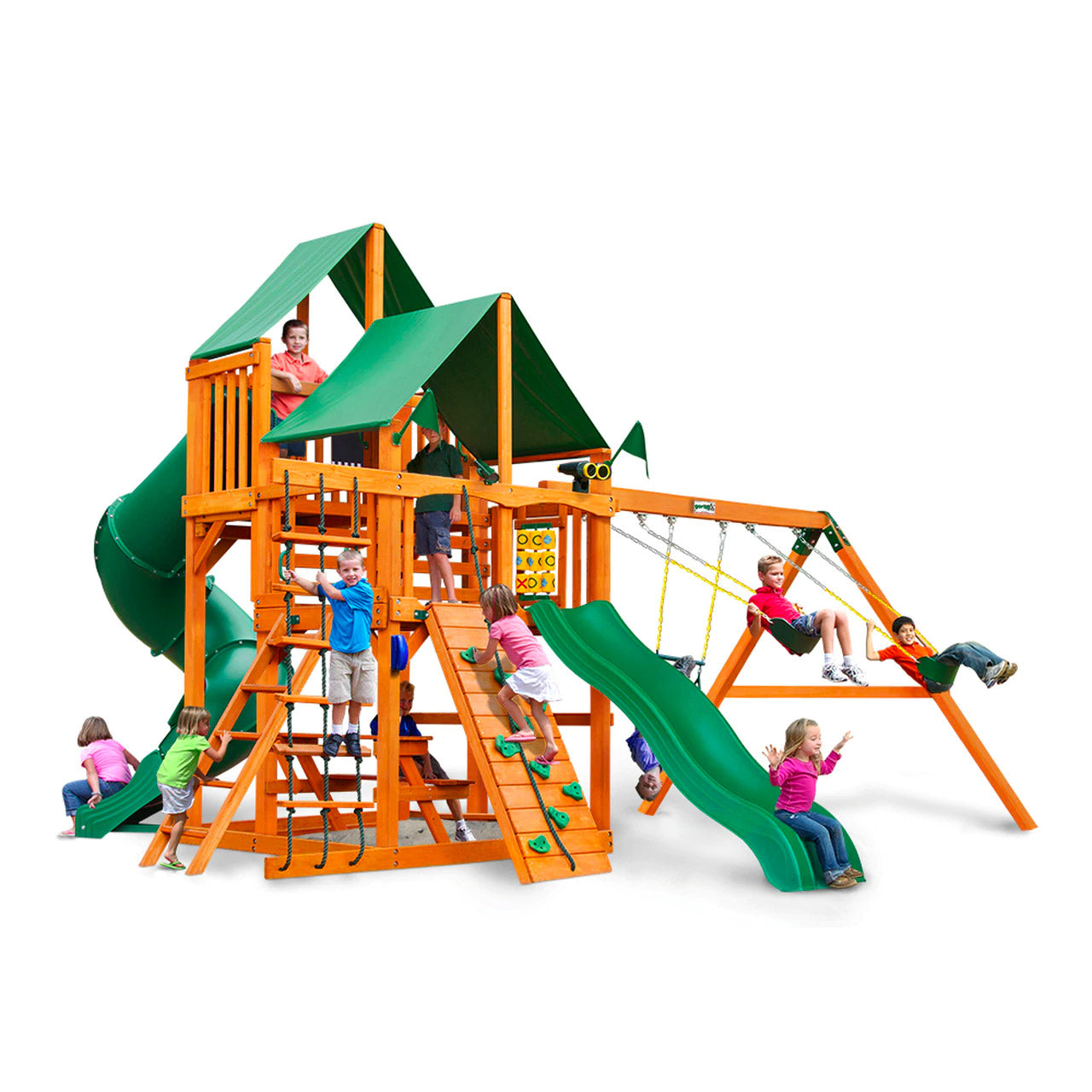 Cedar wooden playset with green canopy roofs, dual belt swings, turbo tube slide, climbing wall, rope ladder, and tic-tac-toe panel with children playing