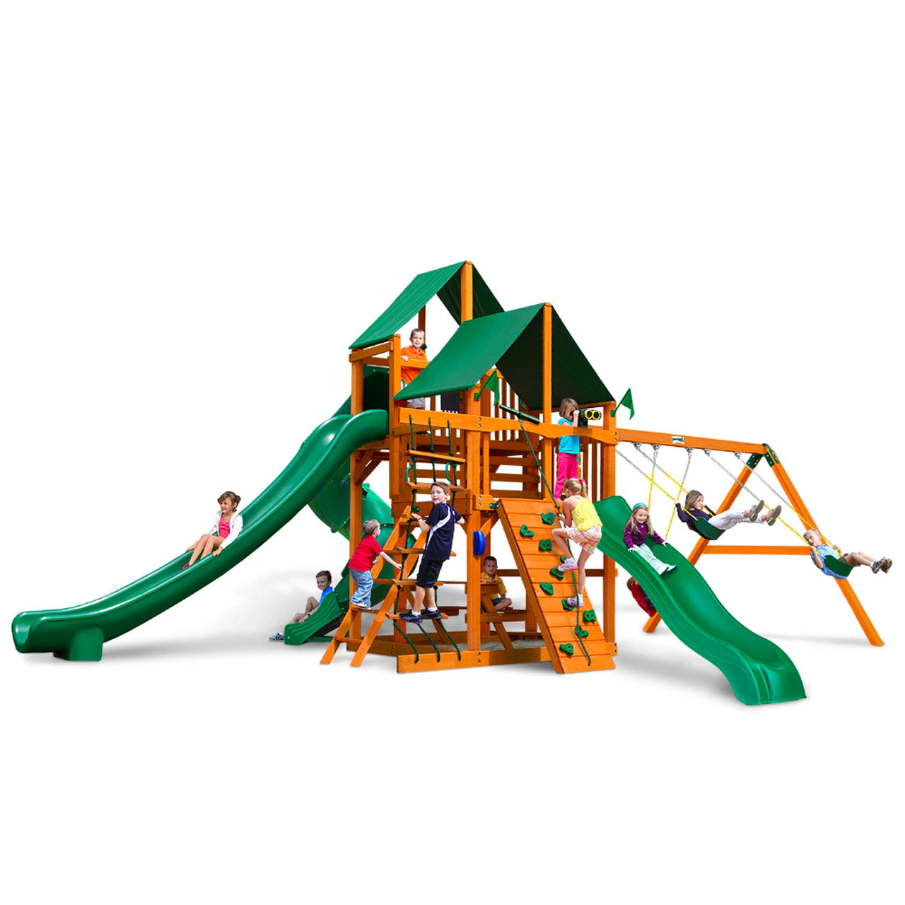 Cedar wooden playset with green vinyl roofs, three slides, swings, climbing walls, and children playing outdoors