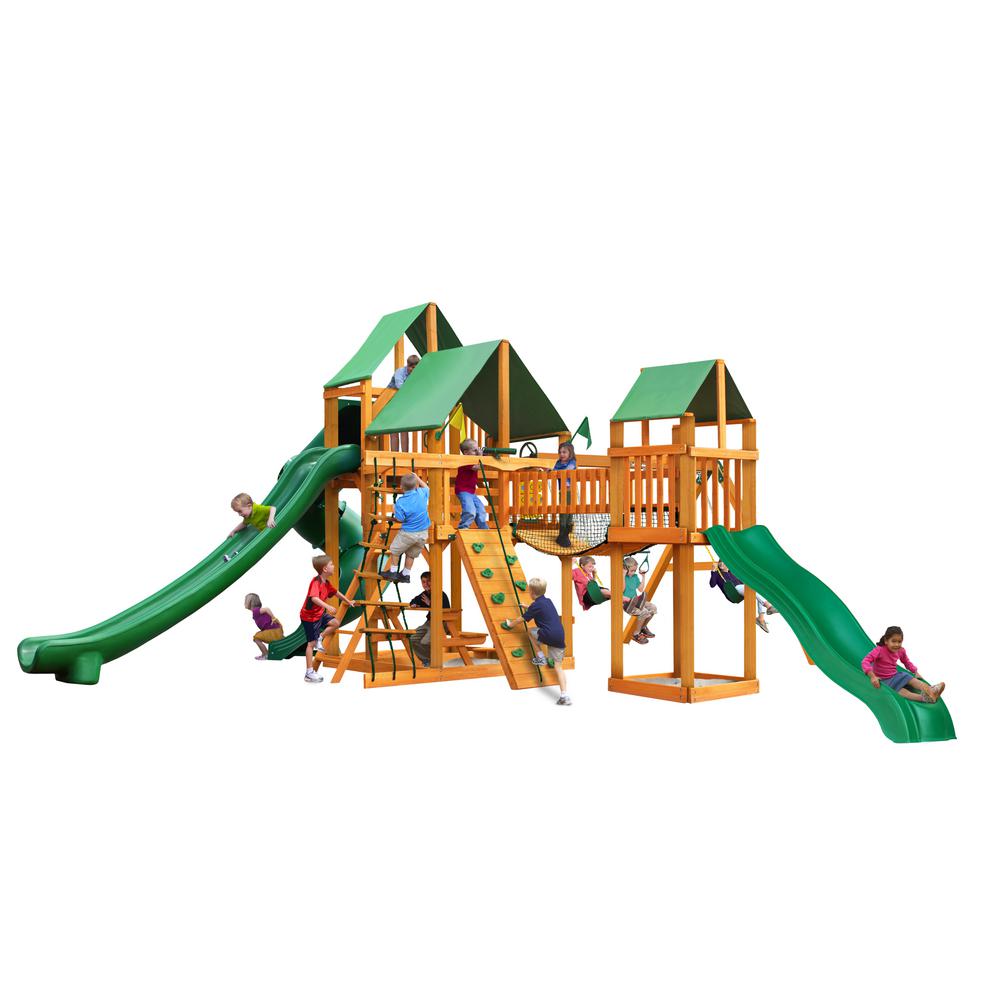 Wooden playset with green vinyl canopy roofs, two slides, climbing wall, rope ladder, swings, and children playing outdoors