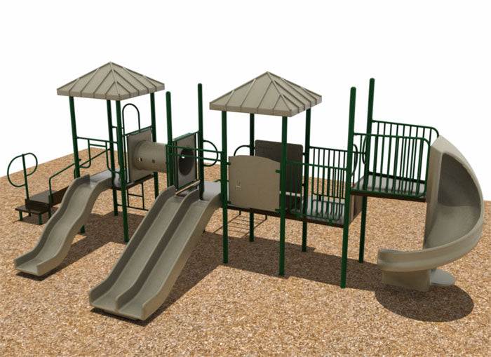 Outdoor playground with multiple slides, crawl tunnel, climbing elements, decks, pyramid roofs on wood chip ground