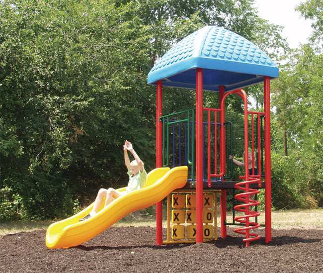 Colorful outdoor modular playground with yellow slide, tic-tac-toe panel, spiral climbing pole, and blue roof