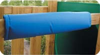 Blue foam safety bumper pad with marine-grade vinyl cover attached to wooden swing set beam with securing straps