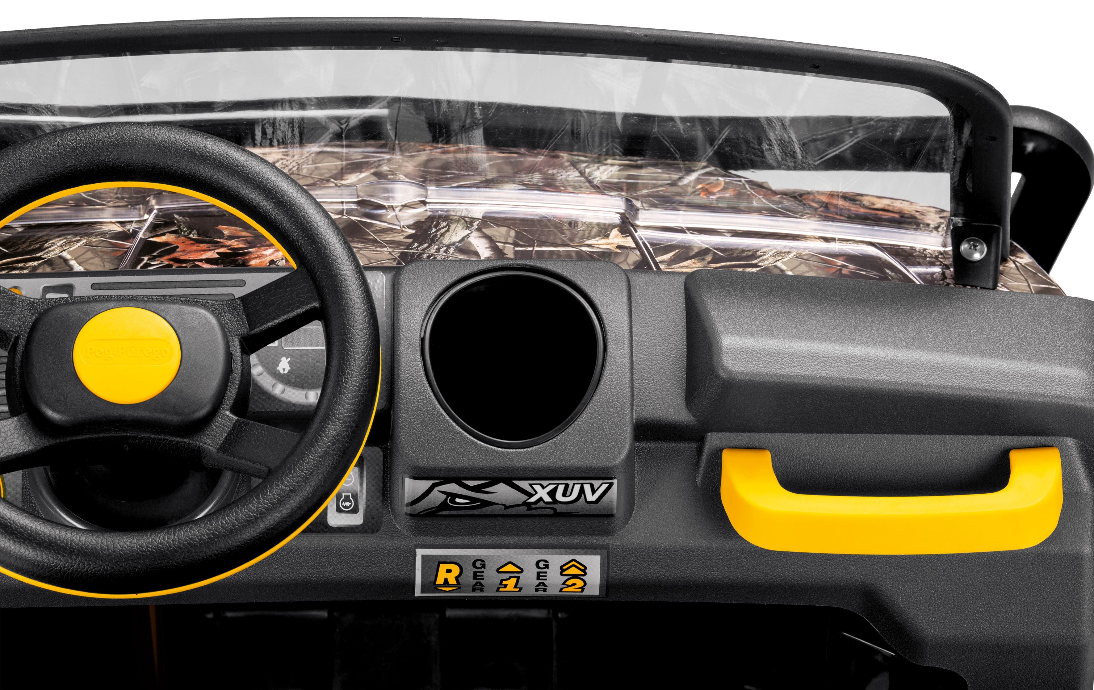 Camouflage ride-on vehicle with black steering wheel, yellow accents, gear shift indicators, and large dump bed with opening tailgate.
