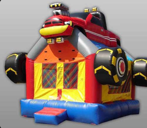 Inflatable bounce house with large red monster truck design, oversized wheels, and mesh windows for ventilation.