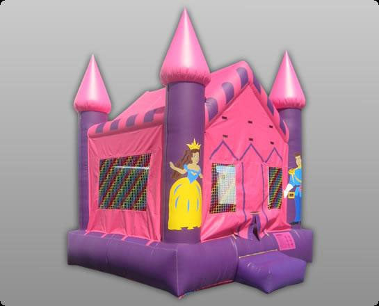 Pink and purple inflatable bounce house with castle turrets and cartoon princess and prince figures on the sides