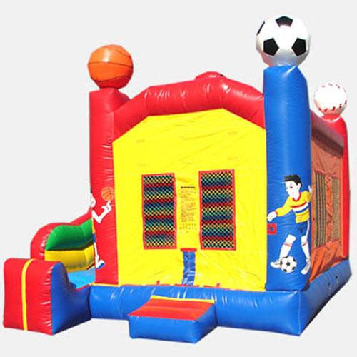 Colorful inflatable sports-themed bounce house with basketball, soccer, and baseball graphics and a slide entrance