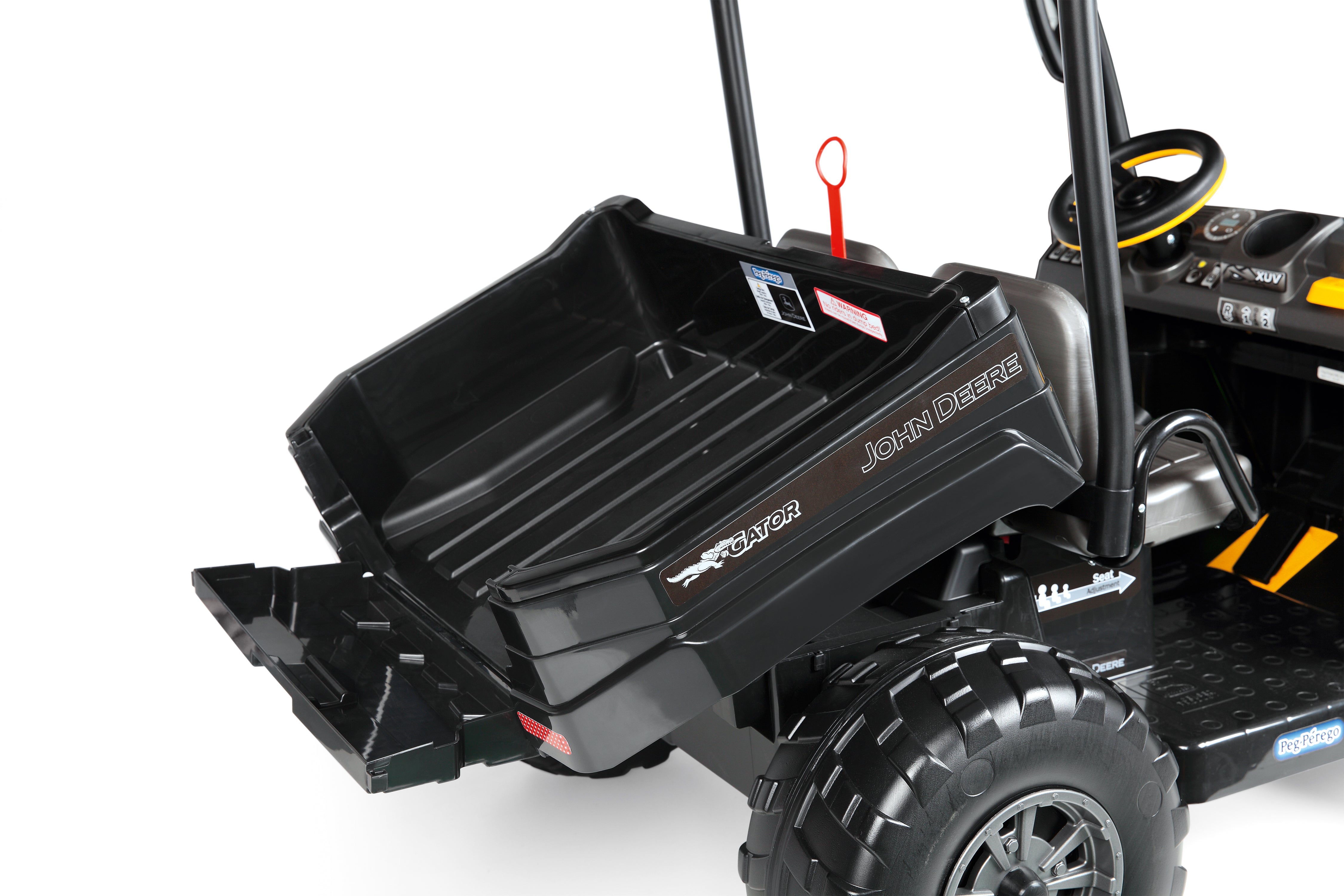 Black ride-on utility vehicle with sporty roof, rugged wheels, large dump bed, and detailed dashboard controls.