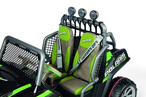Green and black kids' electric ride-on vehicle with side-by-side bucket seats, roll bar, harnesses, and off-road lights