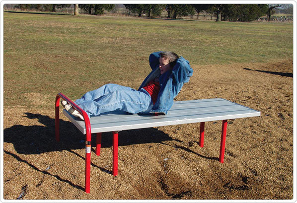 Sit Up Station Challenge with red frame and gray platform in outdoor park, person performing core-strengthening exercise on durable fitness equipment