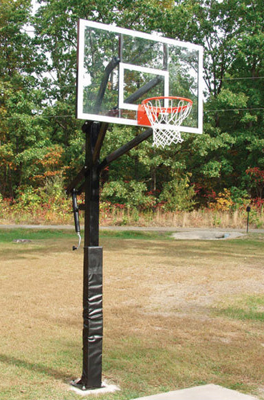Adjustable Basketball Goal with Acrylic Backboard, breakaway rim, nylon net, black padded post on outdoor grassy area