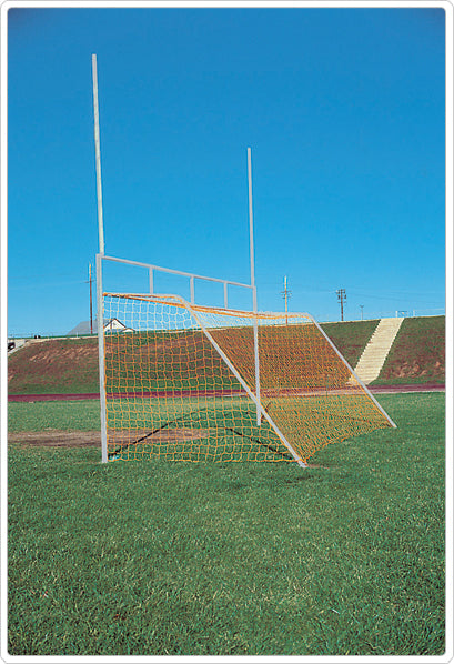 White-framed combined football and soccer goal with orange netting on green field under clear blue sky
