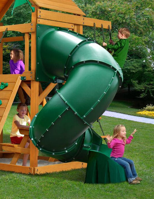 Extreme Turbo Tube Slide 5 Foot High Deck in green attached to wooden playset with children playing outdoors on grass