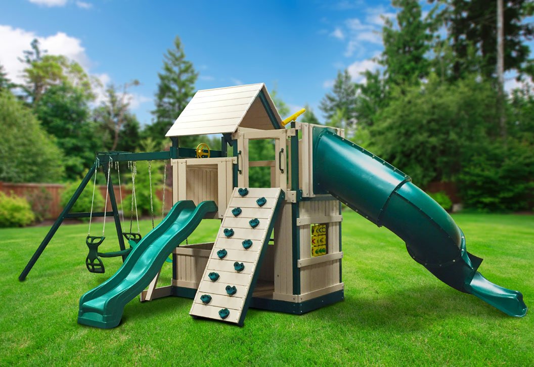 Congo Explorer TreeHouse Climber with sand and green wooden structure, featuring slides, swings, rock climbing wall, play panels, and kid-safe chains.