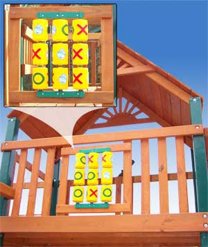 Wooden tic-tac-toe spinner panel with yellow plastic cylinders featuring X, O, and gorilla face icons mounted on playset railing