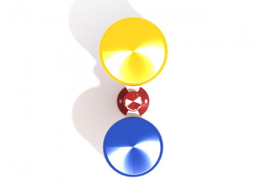 Overhead view of two colorful playground bongo drums, yellow and blue, mounted on a red steel post for outdoor play